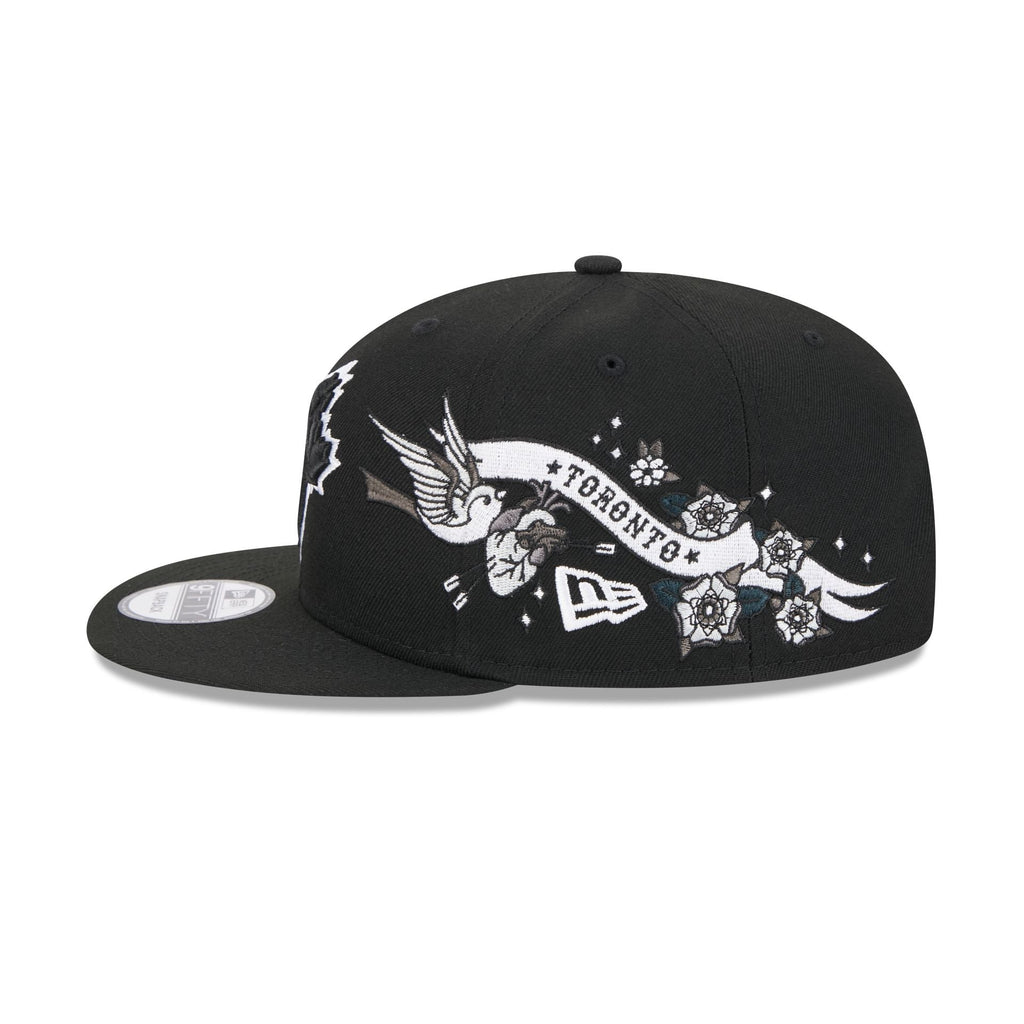 https://cdn.shopify.com/s/files/1/0601/2554/4675/files/60573290_9FIFTY_CITYART_TORJAY_BLK_LSIDE.jpg?v=1724420826