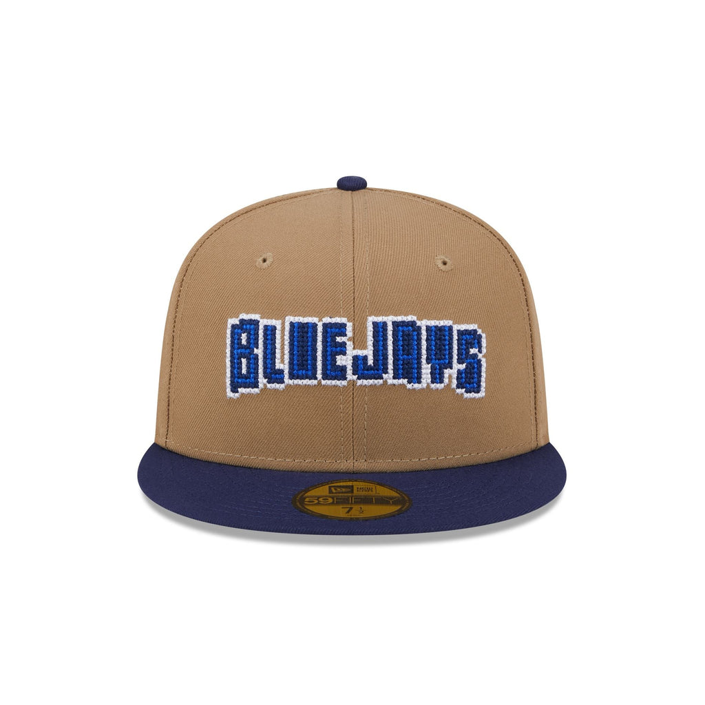https://cdn.shopify.com/s/files/1/0601/2554/4675/files/60573347_59FIFTY_CLASSIC8-BITWORDMA_TORJAYCO_KHK_F.jpg?v=1726173643