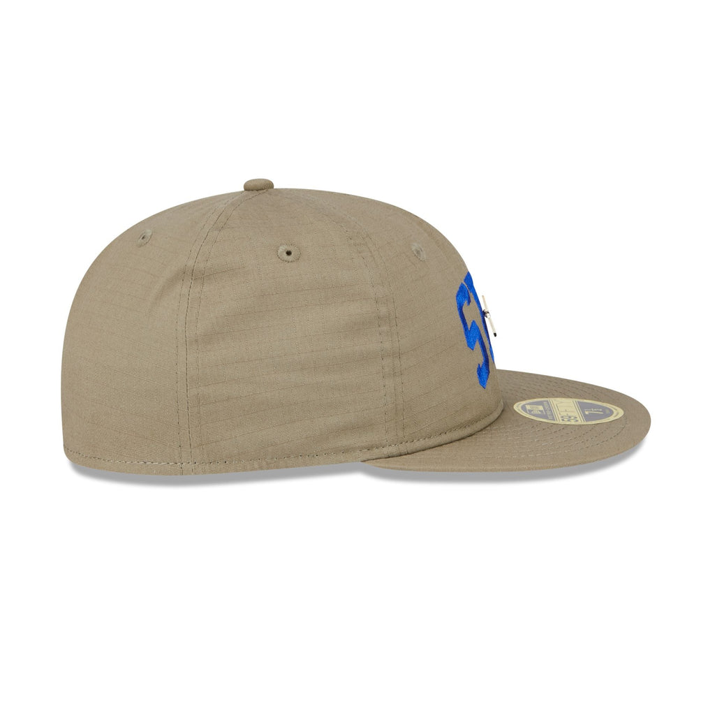https://cdn.shopify.com/s/files/1/0601/2554/4675/files/60588077_RC59FIFTY_LifestyleEnergy_SEAMAR_KHK_RSIDE.jpg?v=1726663143