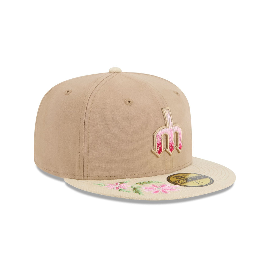 https://cdn.shopify.com/s/files/1/0601/2554/4675/files/60668444_59FIFTY_HANDSTITCHEDFLORAL_SEAMAR_OTC_3QR.jpg?v=1739218486