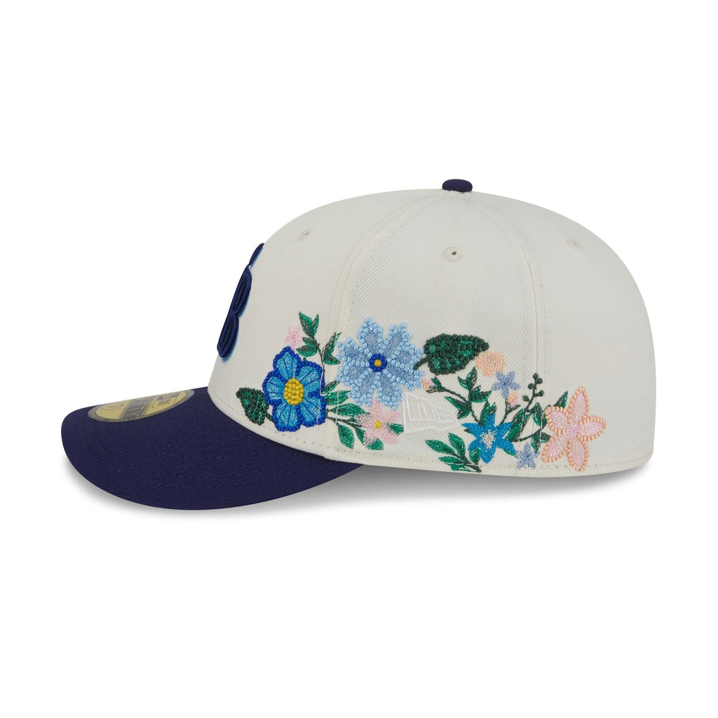 https://cdn.shopify.com/s/files/1/0601/2554/4675/files/60668977_59FIFTY_TONALFLORALS25426_TAMRAY_OTC_LSIDE.jpg?v=1746728139