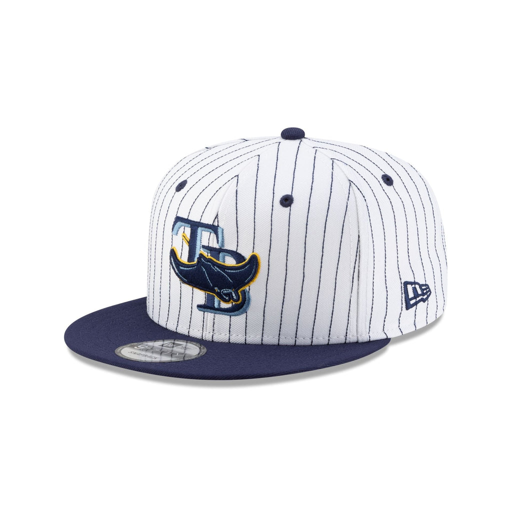 https://cdn.shopify.com/s/files/1/0601/2554/4675/files/60745875_9FIFTY_DECEPTORCOLLECTION_TAMRAY_WHT_3QL.jpg?v=1757531487