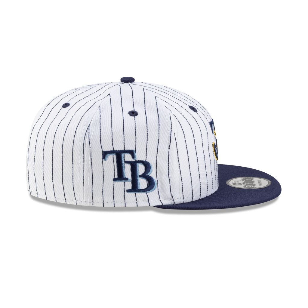 https://cdn.shopify.com/s/files/1/0601/2554/4675/files/60745875_9FIFTY_DECEPTORCOLLECTION_TAMRAY_WHT_RSIDE.jpg?v=1757531487