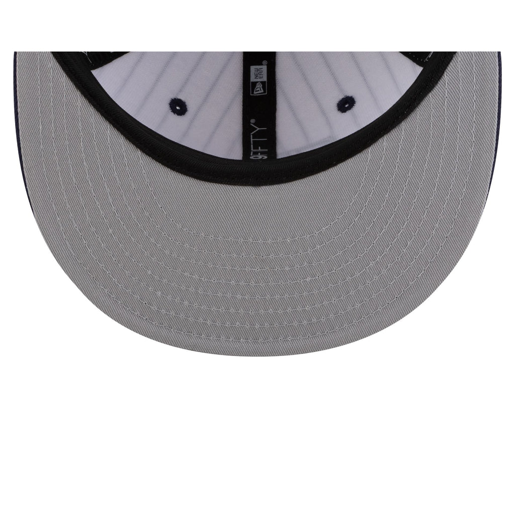 https://cdn.shopify.com/s/files/1/0601/2554/4675/files/60745875_9FIFTY_DECEPTORCOLLECTION_TAMRAY_WHT_UV.jpg?v=1757531487