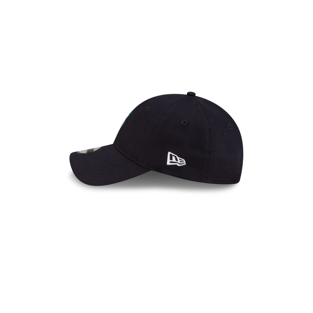 https://cdn.shopify.com/s/files/1/0601/2554/4675/files/60769556_Y9TWENTY_MLB25XHIDDENPIGEONS_COLLAB25_SEAMAR_NAV_LSIDE.jpg?v=1752090952