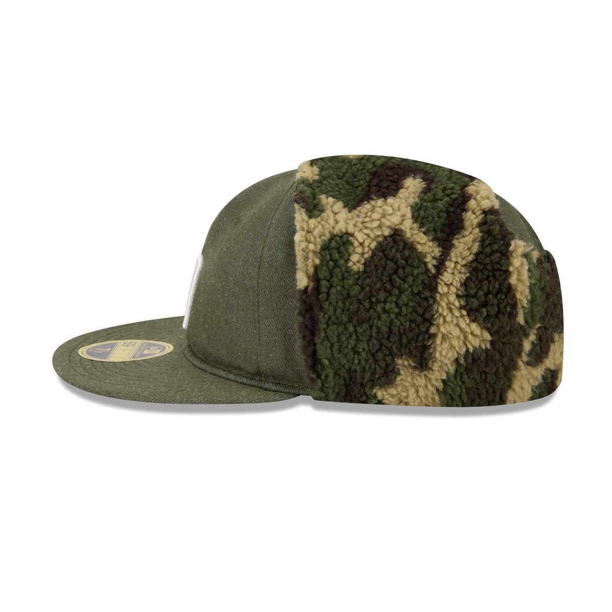 https://cdn.shopify.com/s/files/1/0601/2554/4675/files/60772924_RC59FIFTY_CAMODOGEAR595ORC_SADPAD_XGR_LSIDE.jpg?v=1762457325