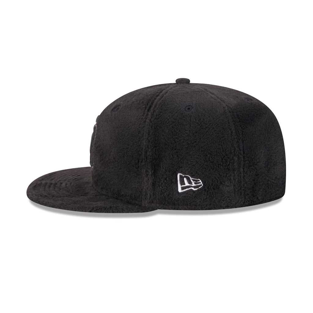 https://cdn.shopify.com/s/files/1/0601/2554/4675/files/60832807_59FIFTY_LifestyleEnergy_SADPAD_BLK_LSIDE.jpg?v=1764616395