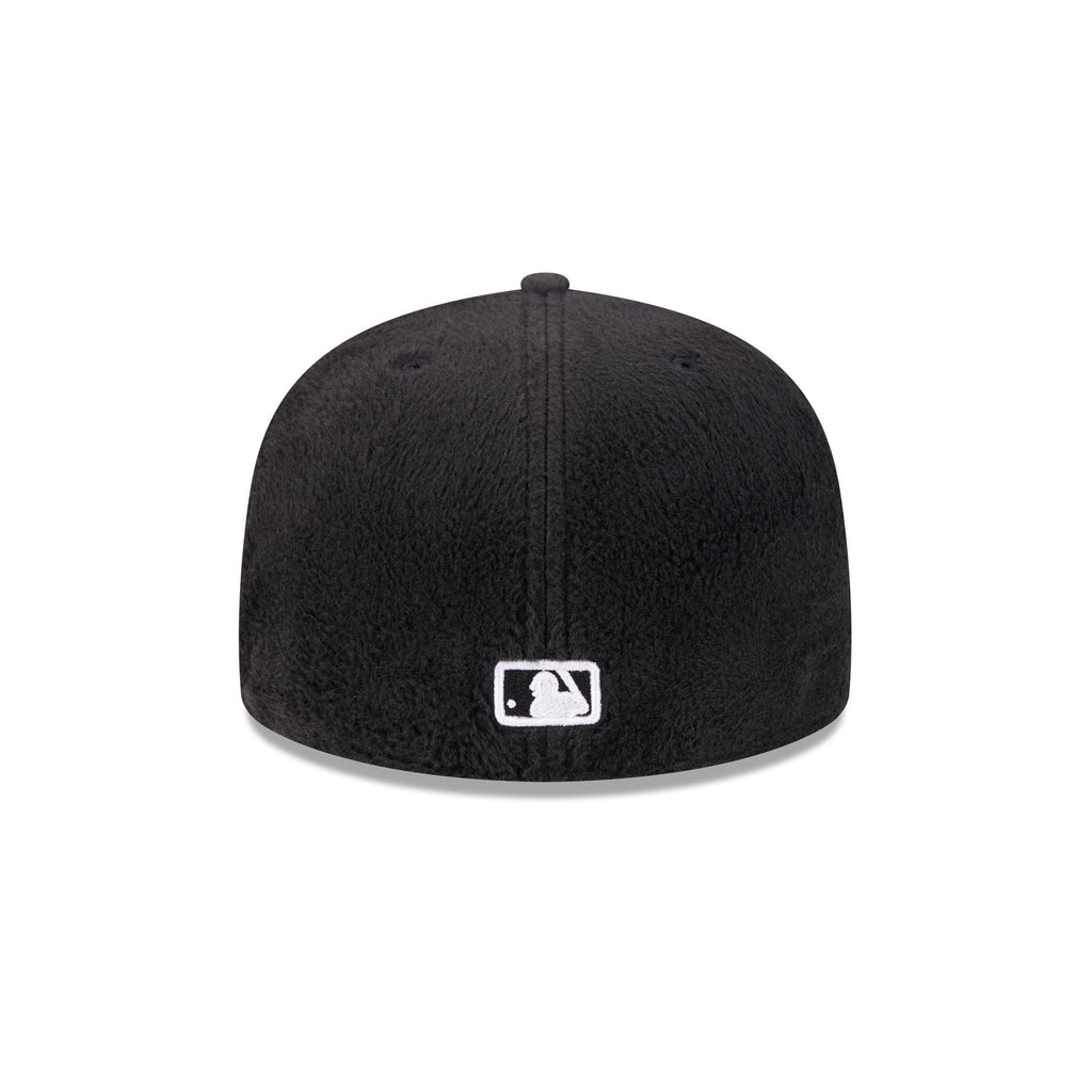 https://cdn.shopify.com/s/files/1/0601/2554/4675/files/60832807_59FIFTY_LifestyleEnergy_SADPAD_BLK_R.jpg?v=1764616395