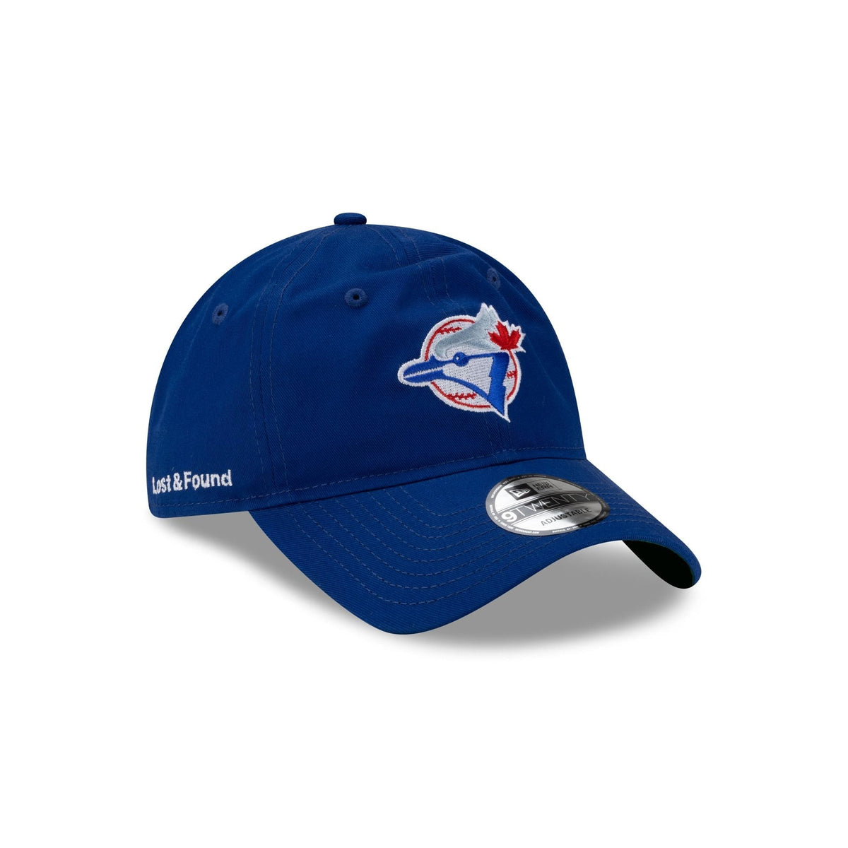 https://cdn.shopify.com/s/files/1/0601/2554/4675/files/60842436_9TWENTY_COLLAB25_LOST_26FOUNDxBLUEJAYS_TORJAYCO_BLU_3QR.jpg?v=1756234040