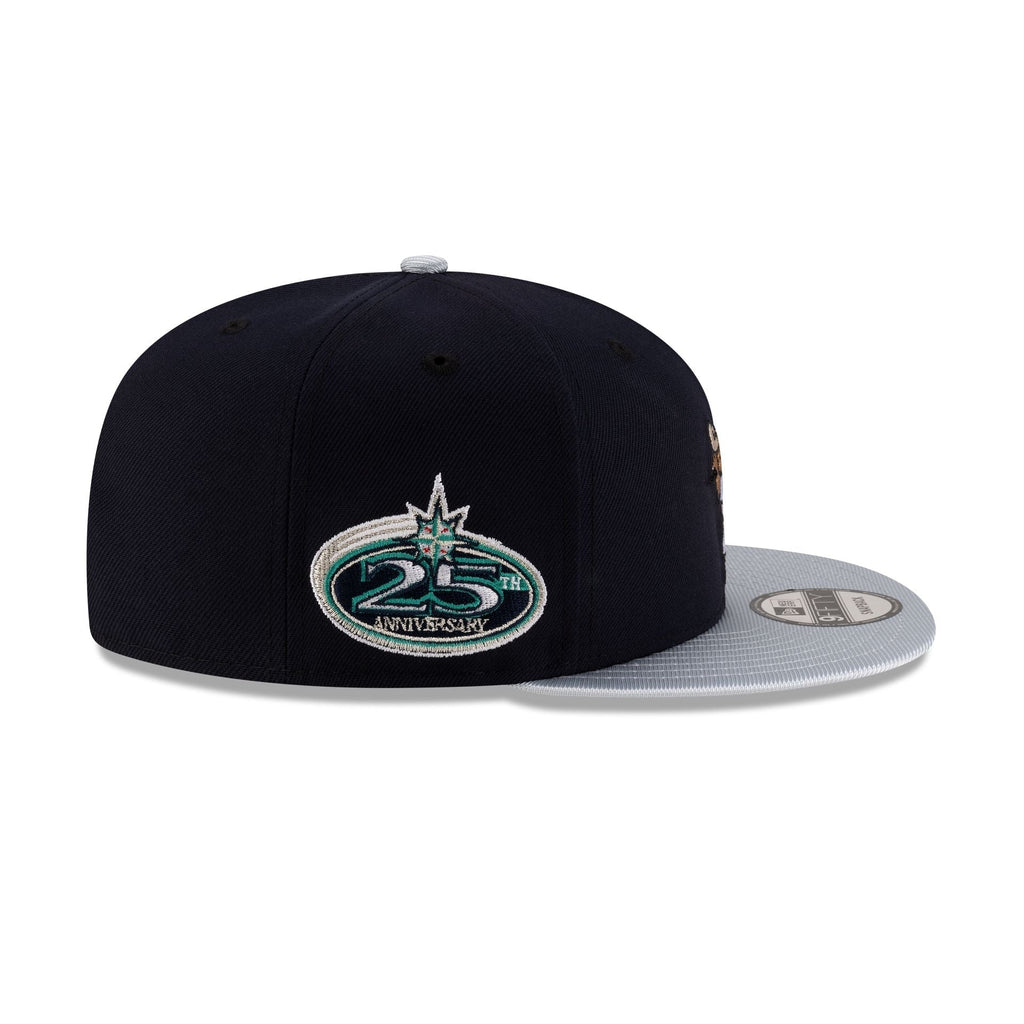 https://cdn.shopify.com/s/files/1/0601/2554/4675/files/70929781_9FIFTY_MLBMASCOT_25_SEAMARCO_NAV_RSIDE.jpg?v=1741802267