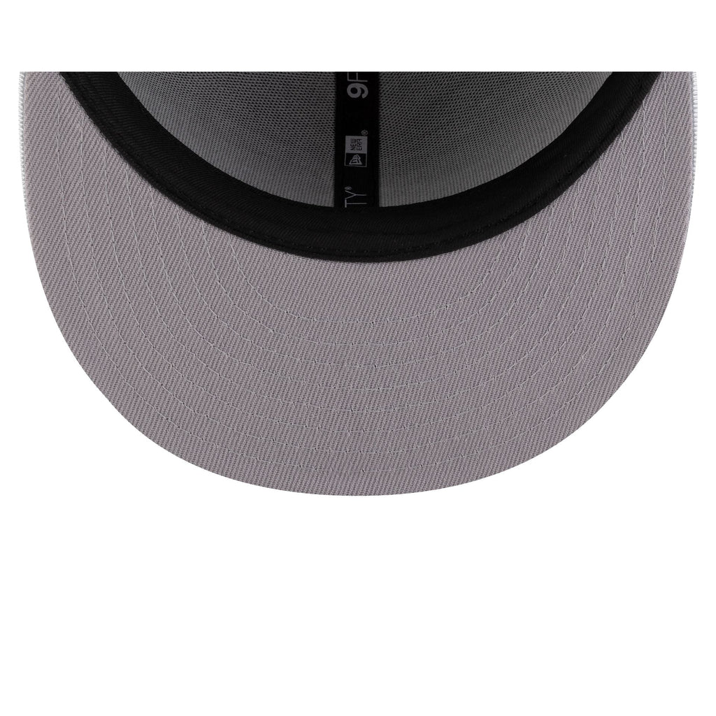 https://cdn.shopify.com/s/files/1/0601/2554/4675/files/70929781_9FIFTY_MLBMASCOT_25_SEAMARCO_NAV_UV.jpg?v=1741802267