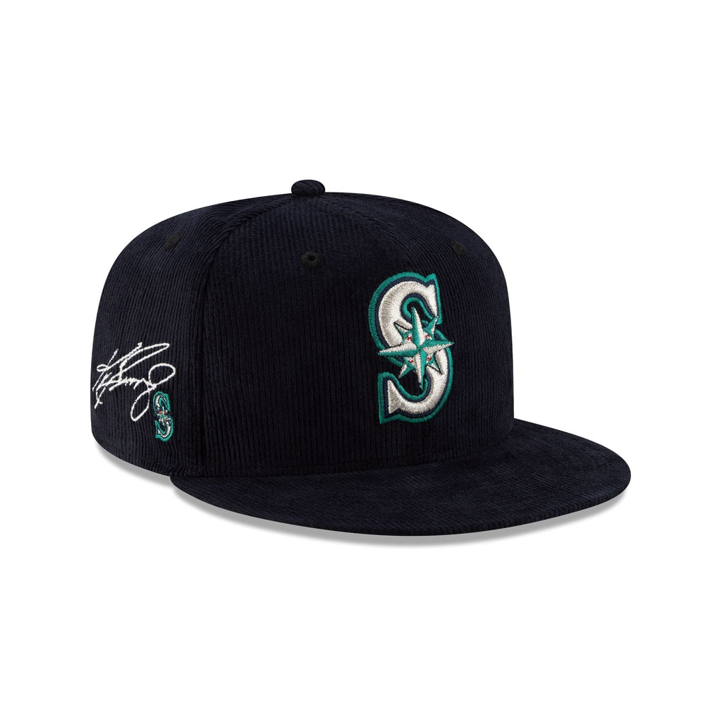 https://cdn.shopify.com/s/files/1/0601/2554/4675/files/70971301_59FIFTY_MLB25_JUSTCAPS_PLAYERCORD_SEAMAR_KENGRIF_NAV_3QR.jpg?v=1754597073